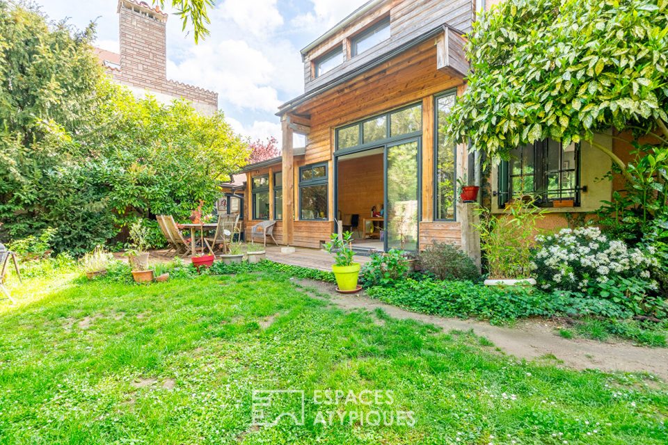 Maison familiale avec véranda et jardin bucolique