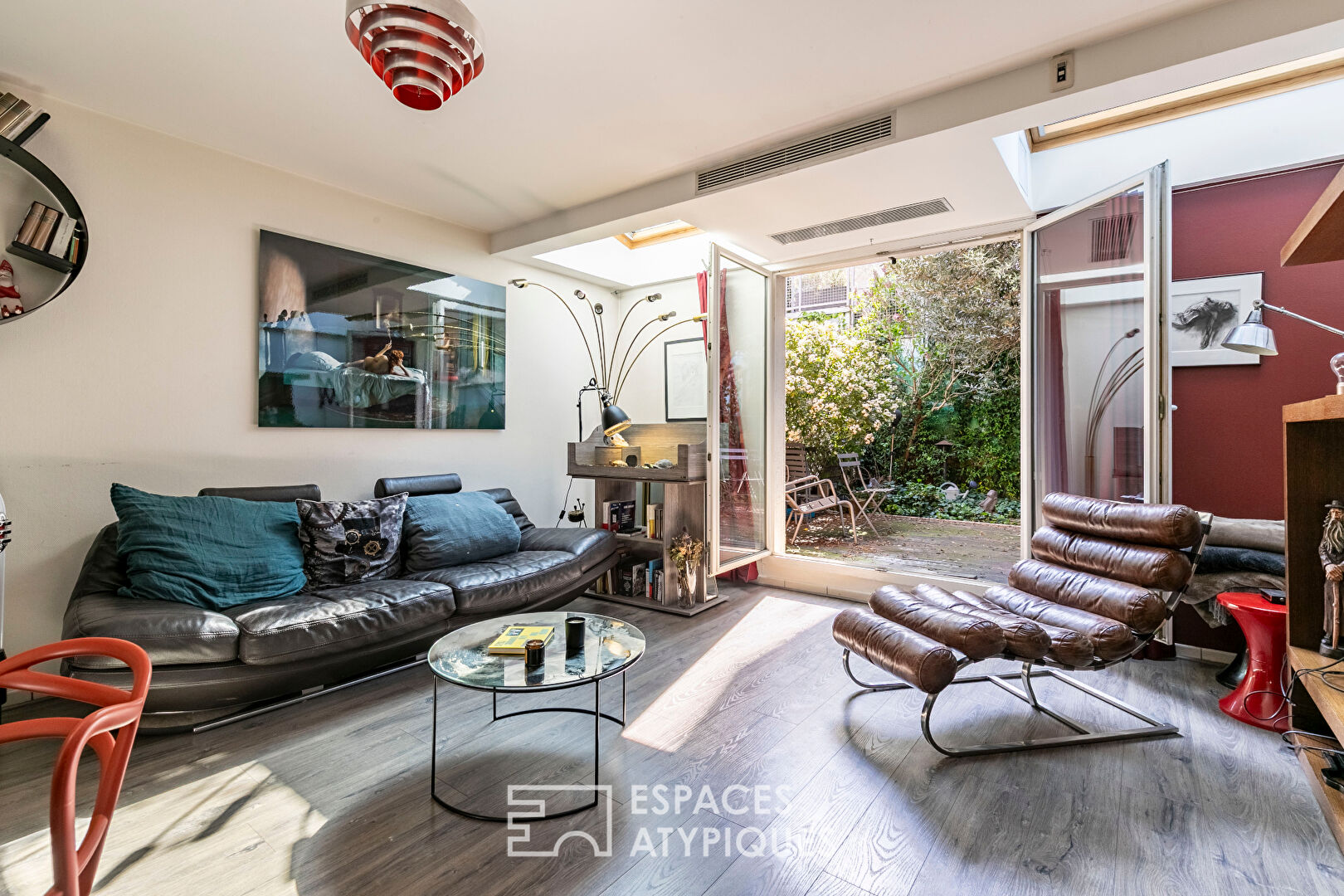 Maison en copropriété avec terrasse ombragée et garage en coeur de ville