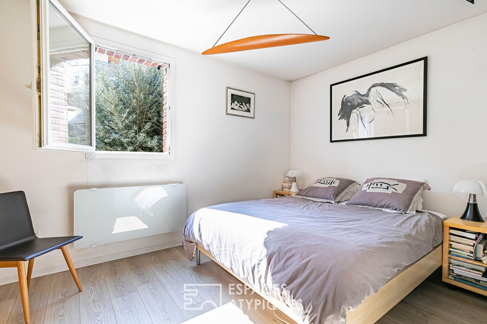Maison en copropriété avec terrasse ombragée et garage en coeur de ville