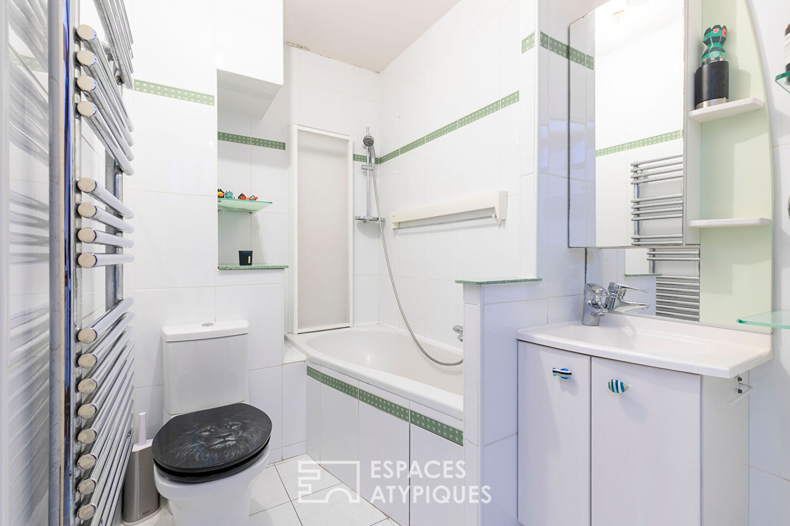 Maison en copropriété avec terrasse ombragée et garage en coeur de ville