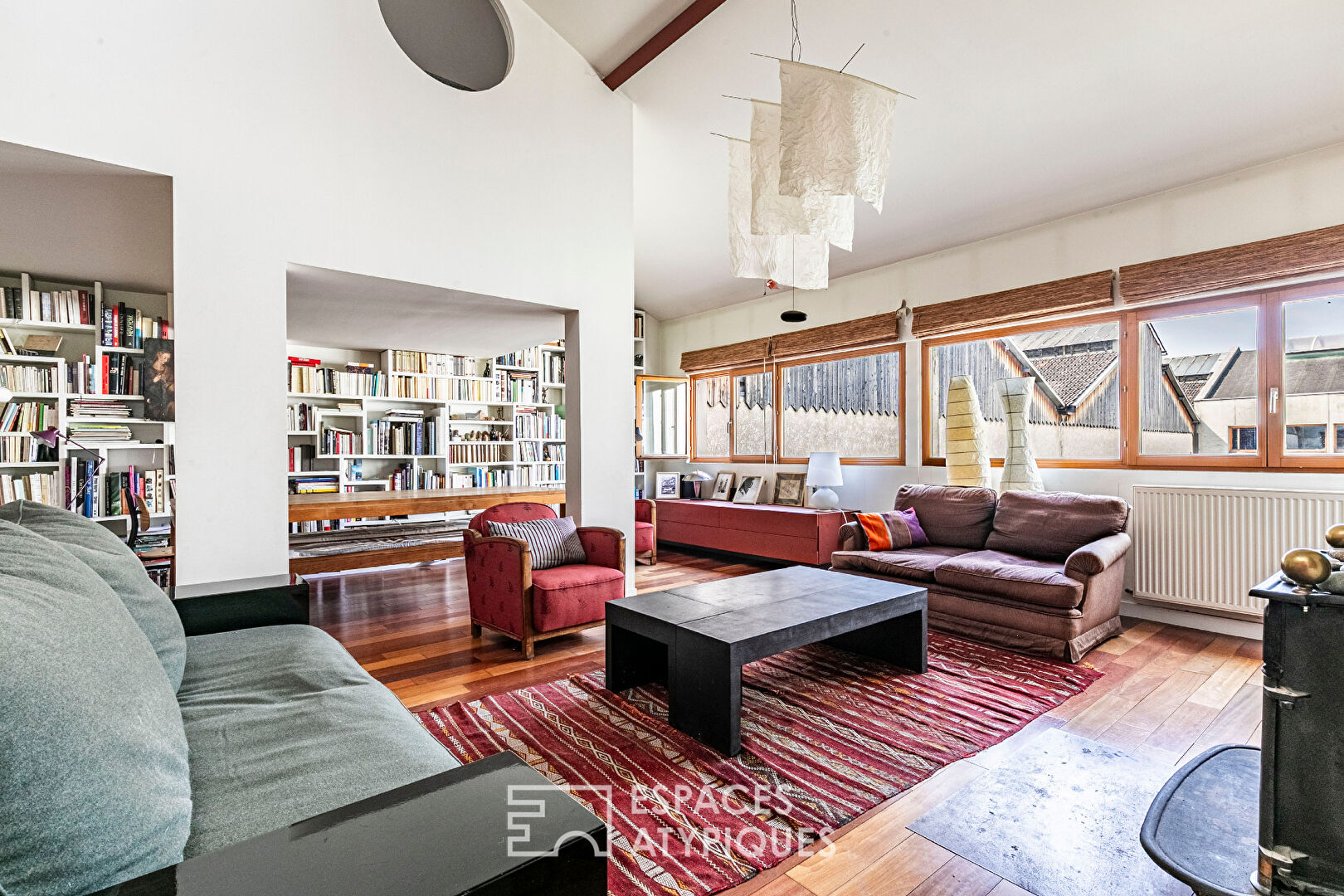 Architect-designed duplex loft and top floor overlooking a lush garden