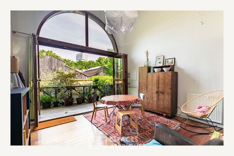 Architect-designed duplex loft and top floor overlooking a lush garden