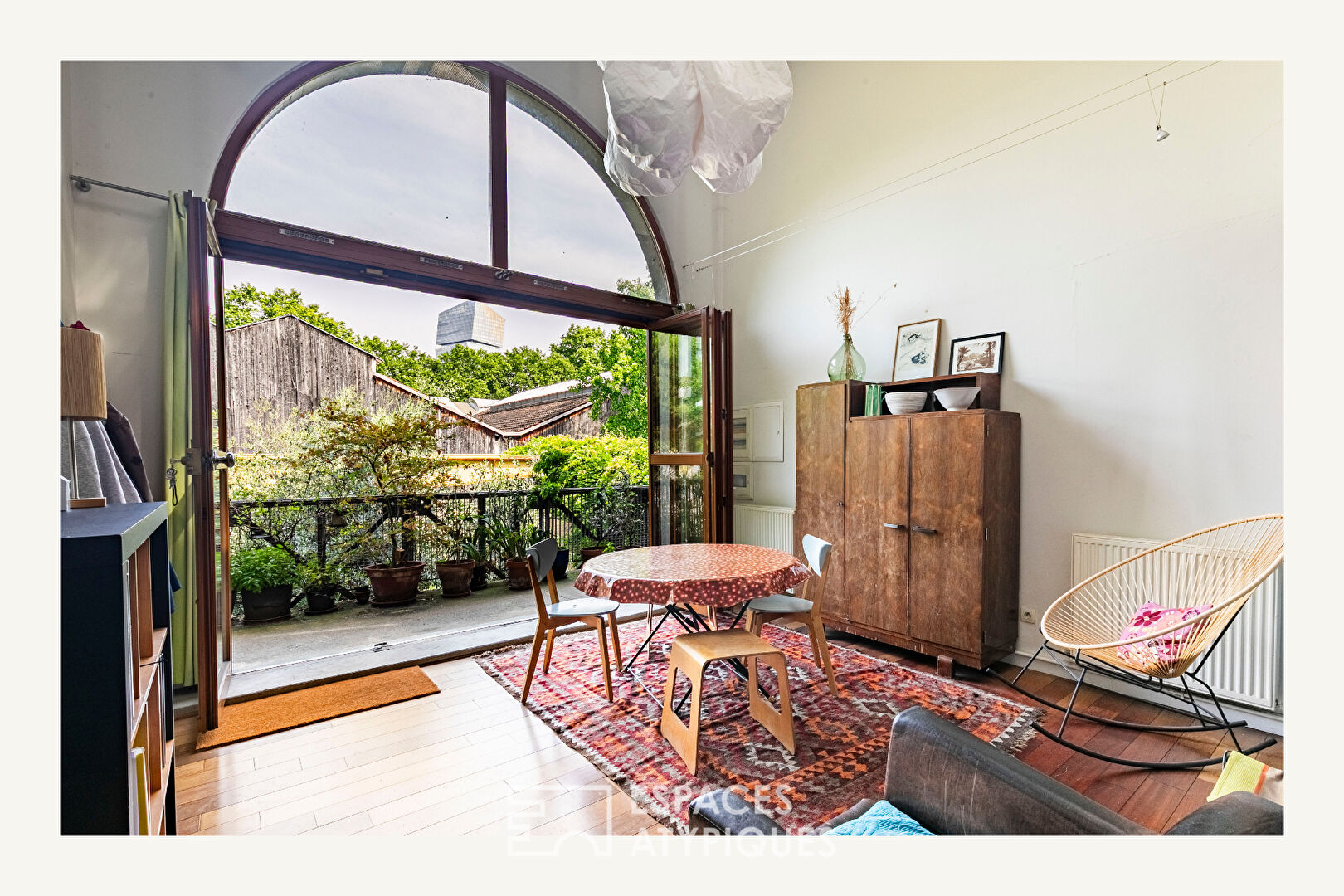 Architect-designed duplex loft and top floor overlooking a lush garden