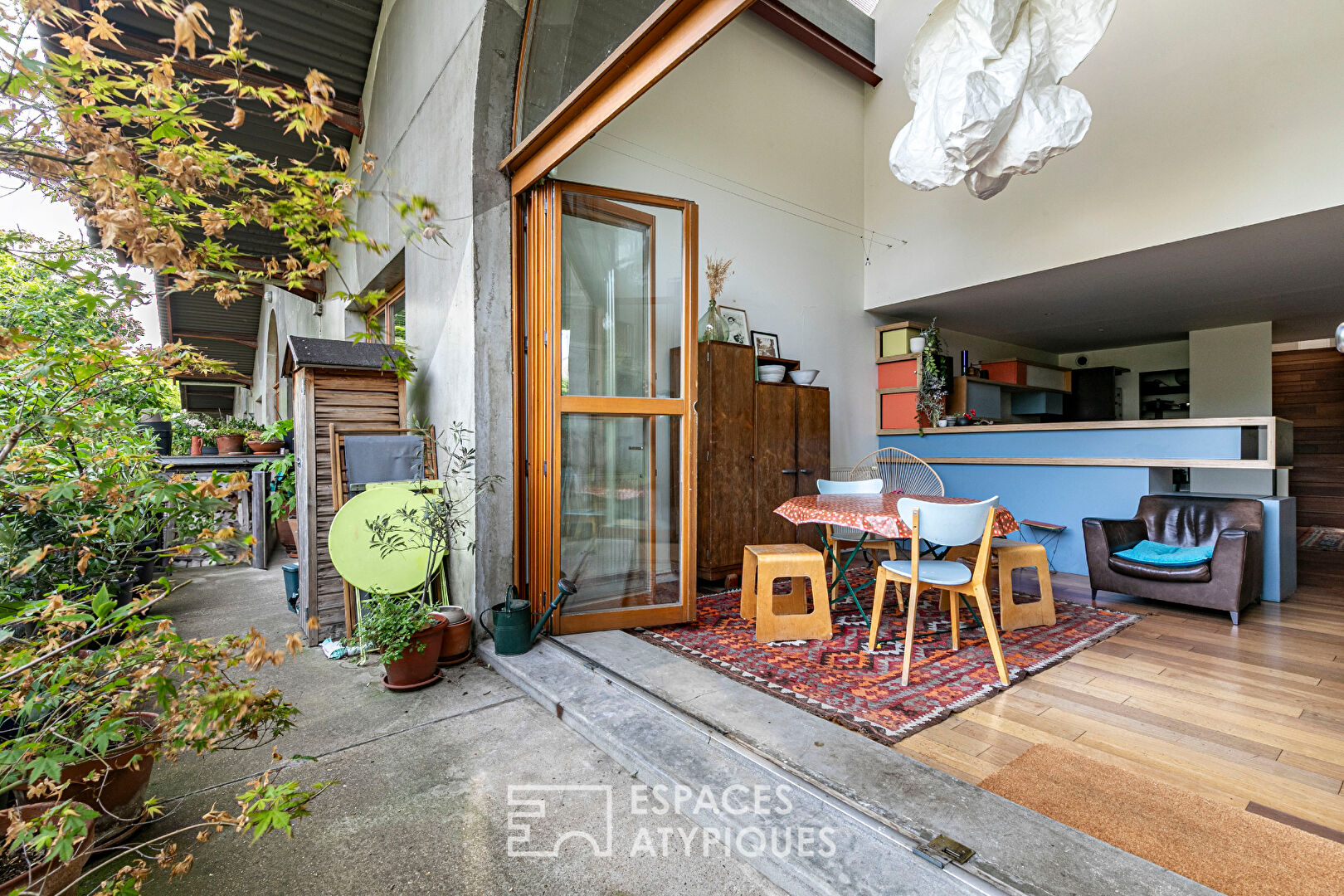 Architect-designed duplex loft and top floor overlooking a lush garden