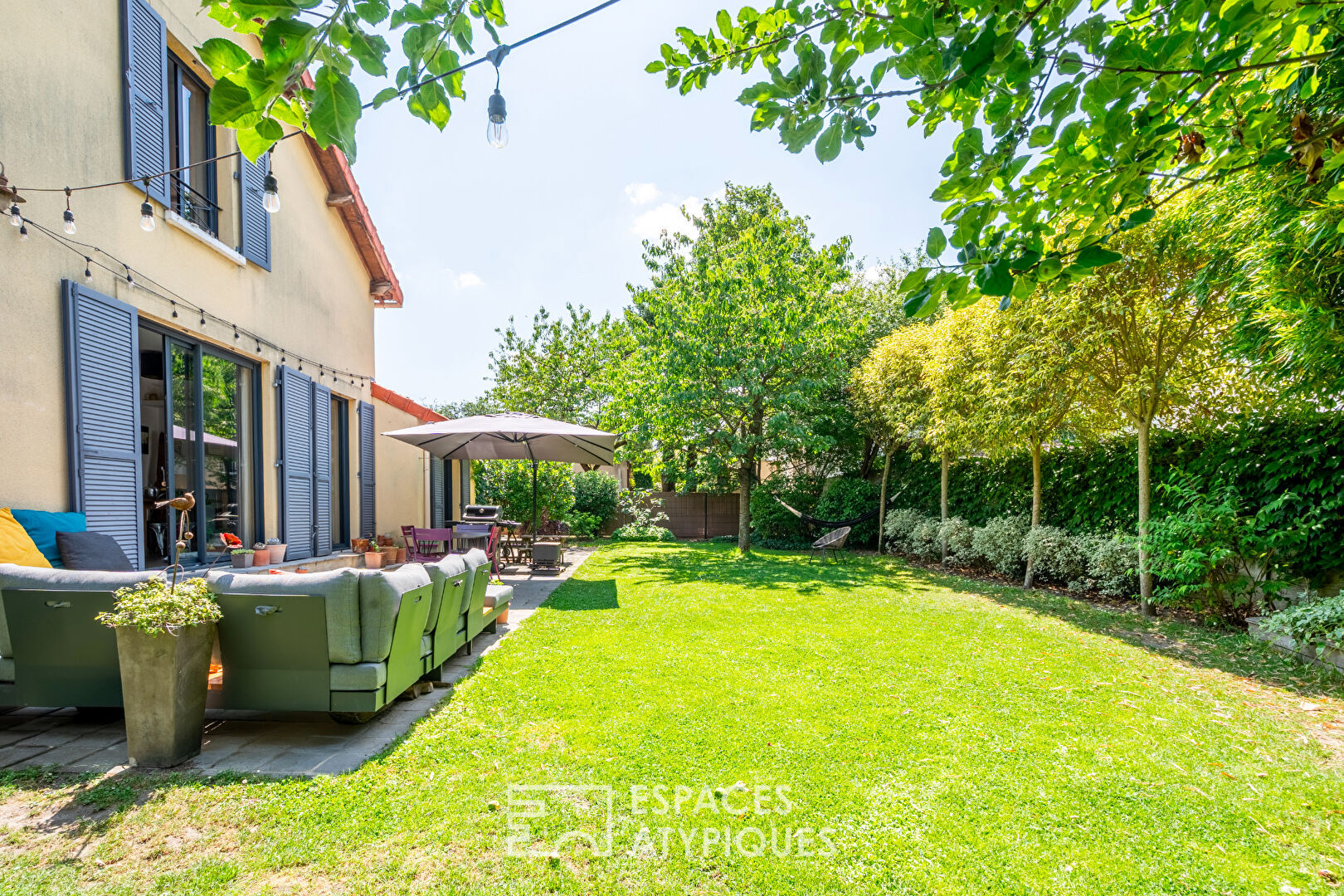 Maison de famille avec jardin arboré