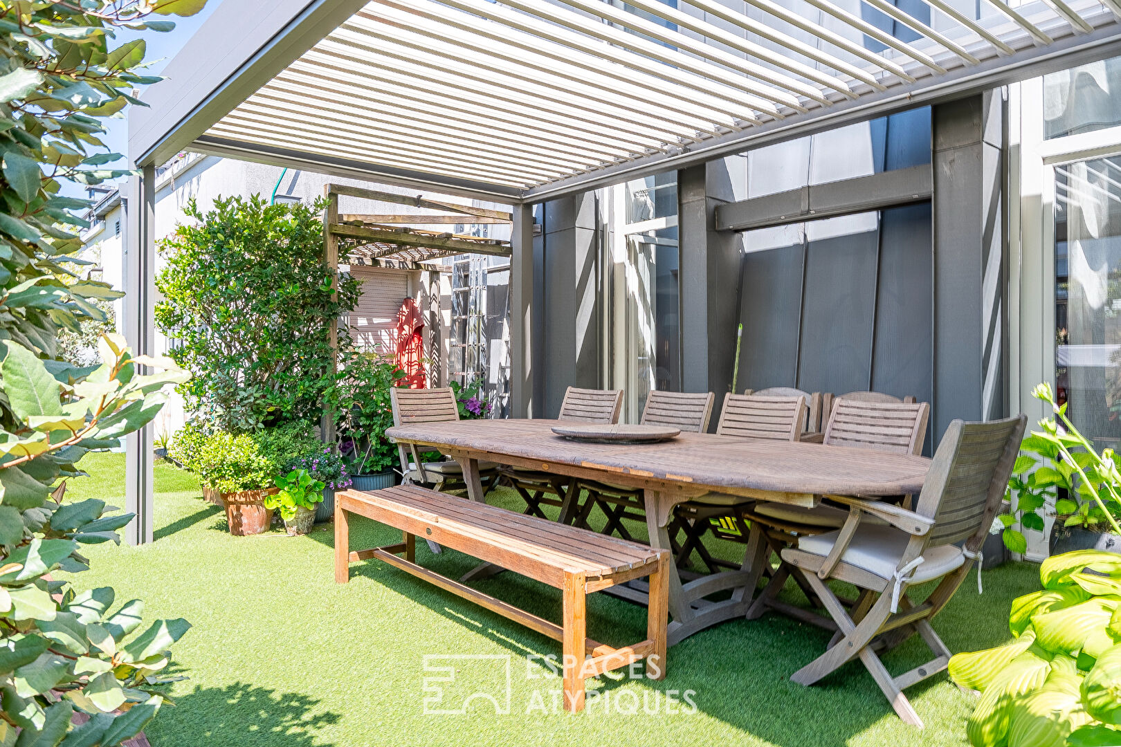 Duplex sur le toit avec jardin suspendu