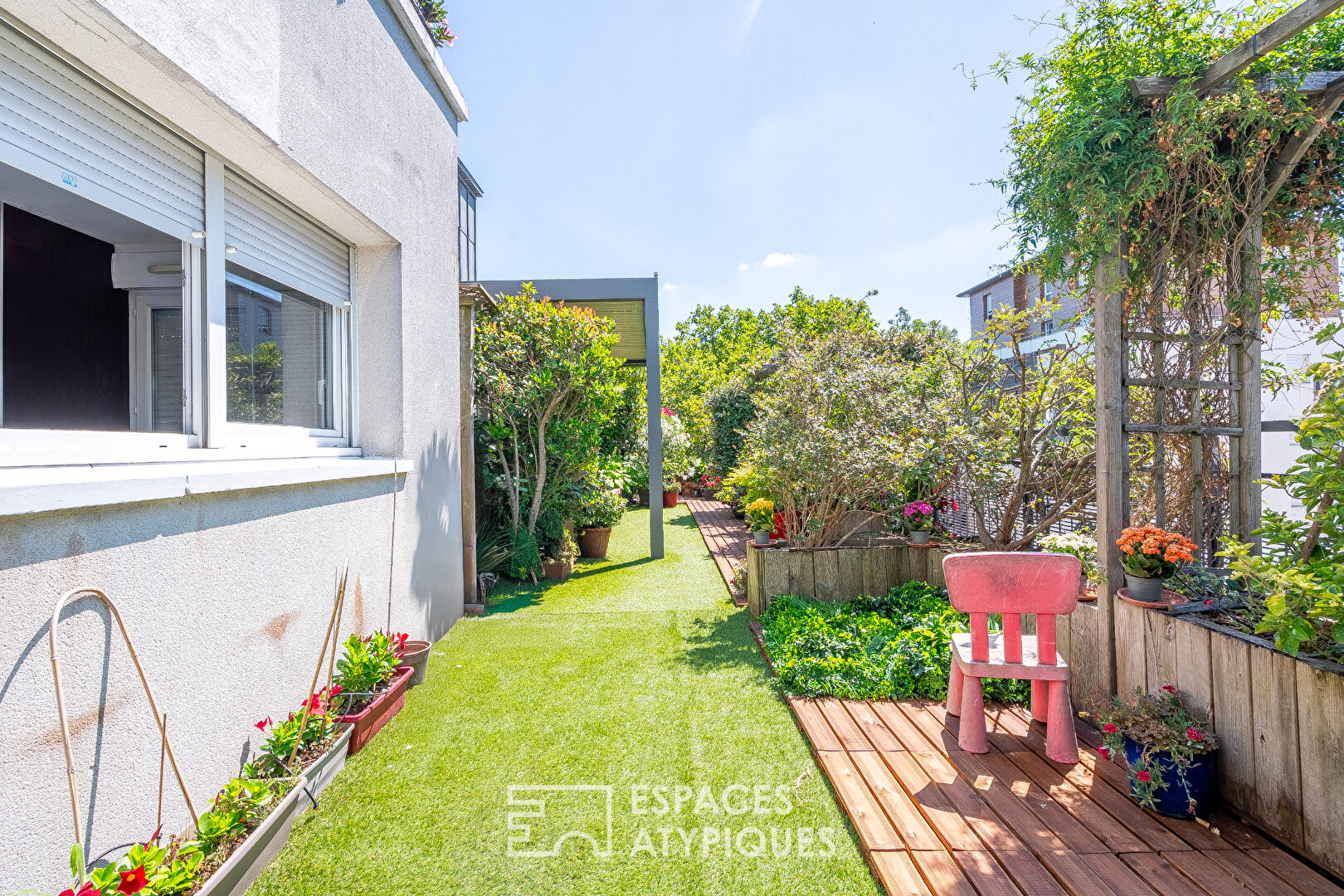 Duplex sur le toit avec jardin suspendu