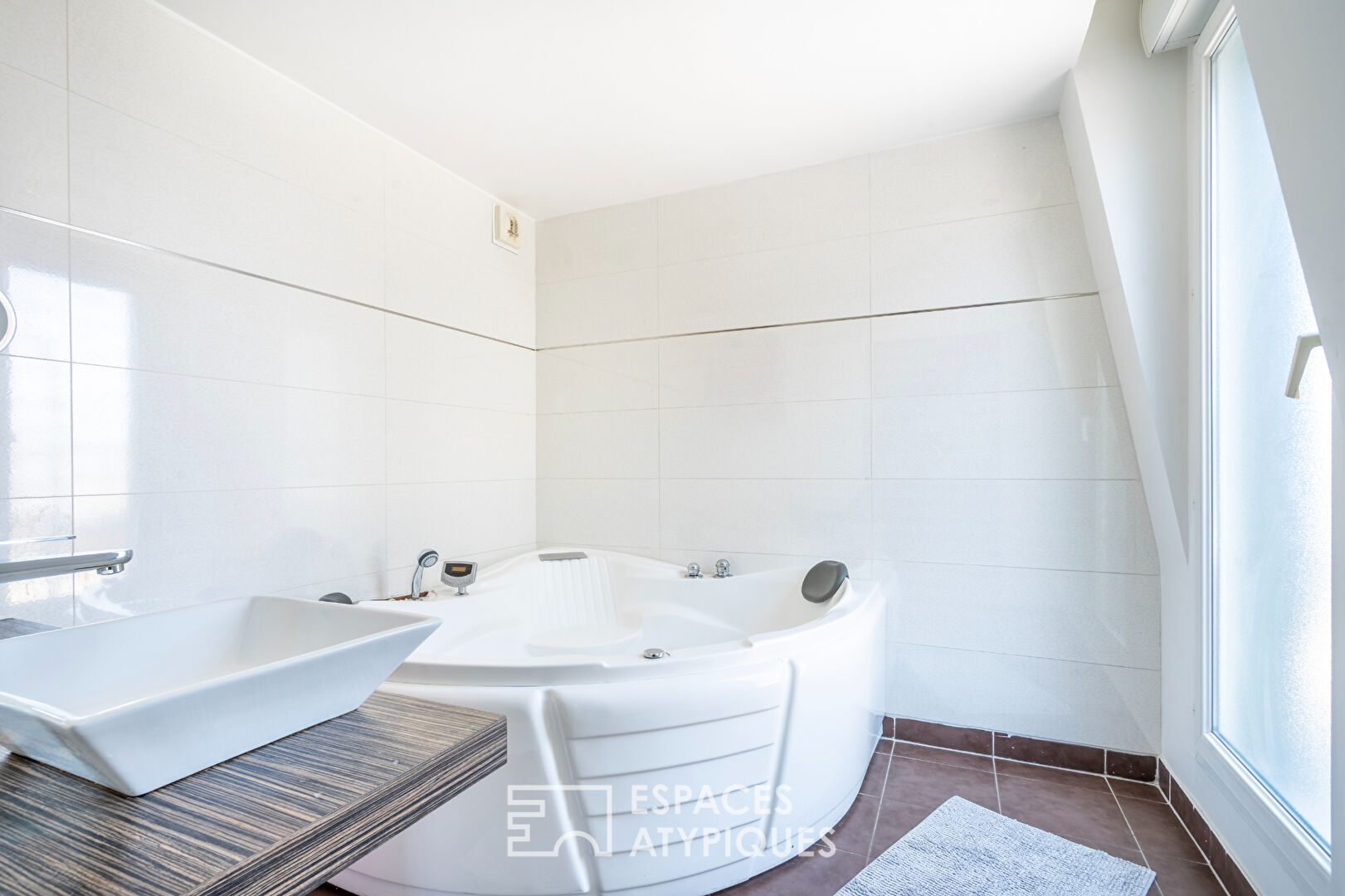 Duplex sur le toit avec jardin suspendu