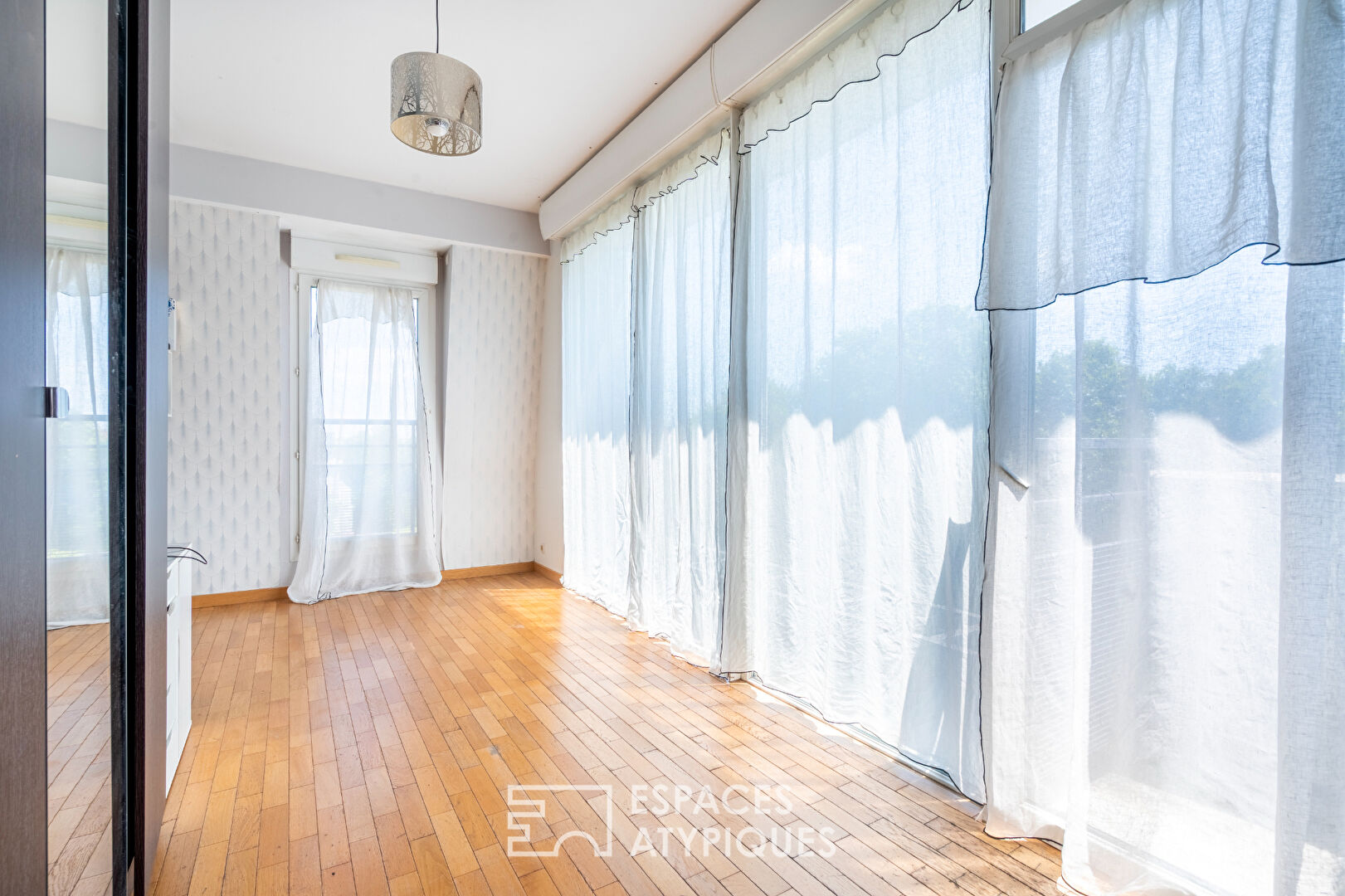 Duplex sur le toit avec jardin suspendu
