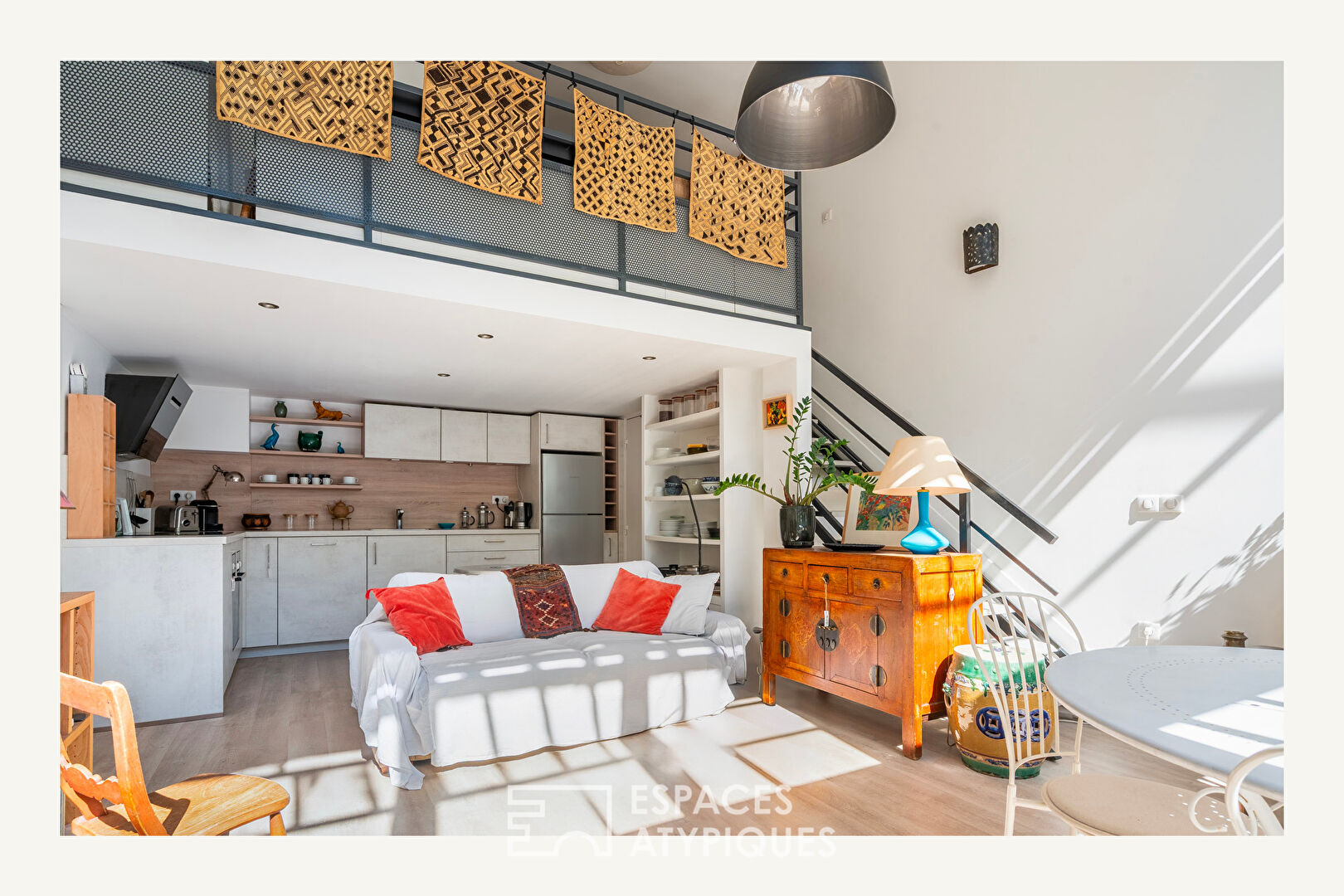 Duplex loft with bucolic garden in the heart of the city