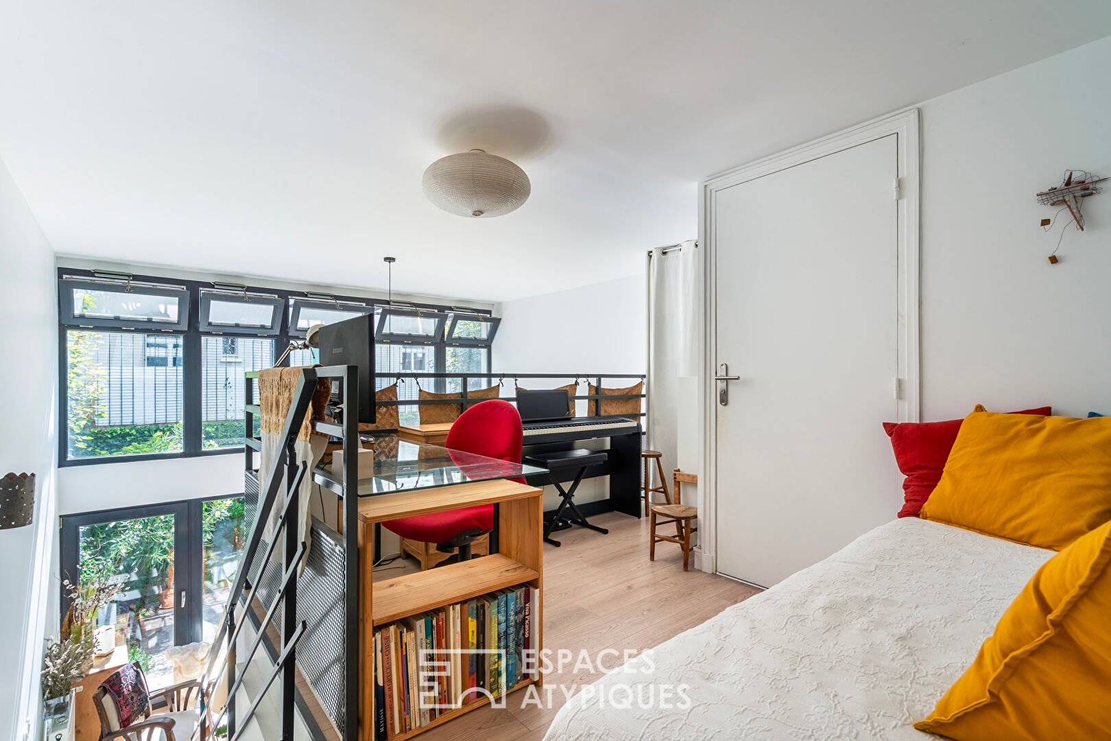Duplex loft with bucolic garden in the heart of the city