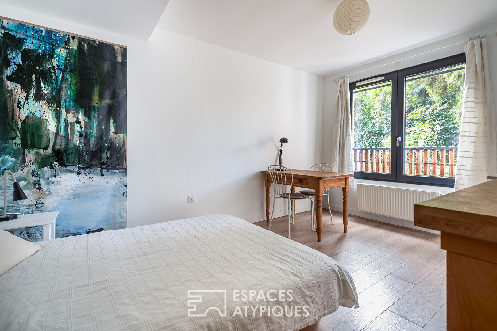 Duplex loft with bucolic garden in the heart of the city