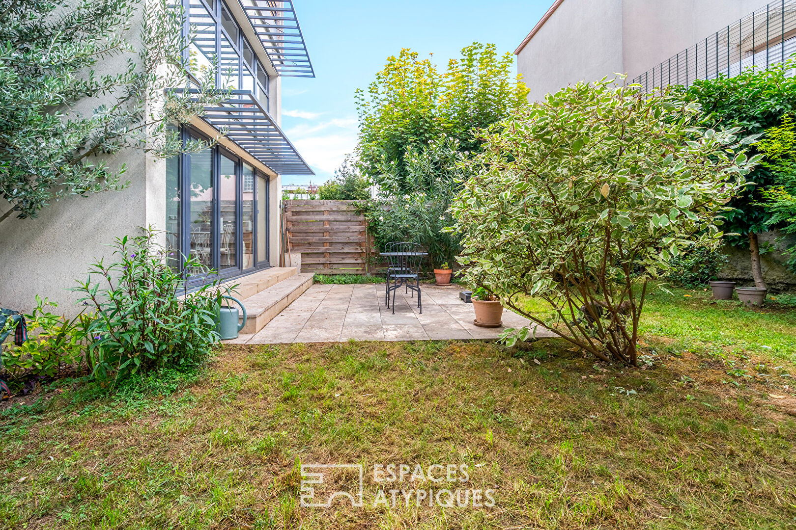 Duplex loft with bucolic garden in the heart of the city