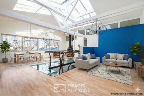 Duplex lumineux sous verrière à la lisière de Paris