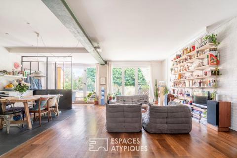 Loft sur jardin verdoyant dans une ancienne boutonnerie