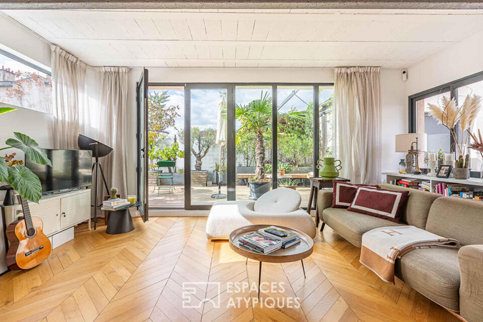 Appartement d'architecte avec terrasse arborée
