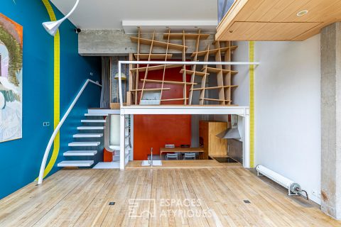 Artist’s loft with cascading glass roofs