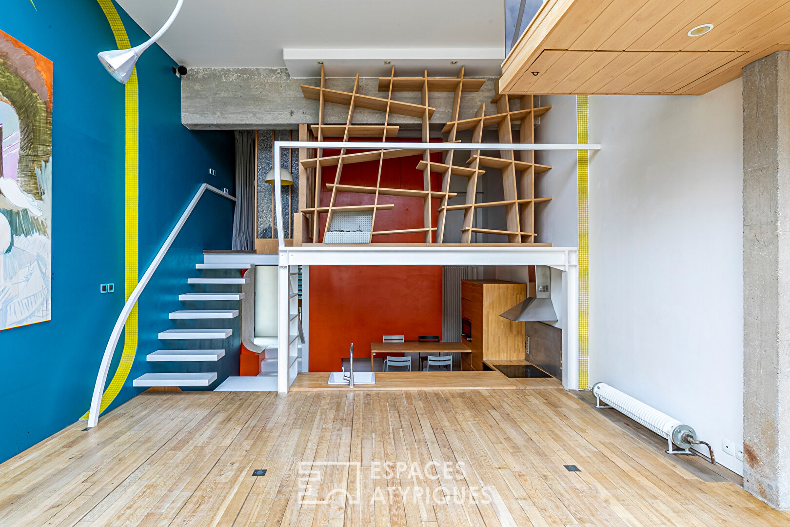Artist’s loft with cascading glass roofs