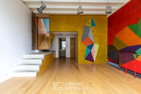 Artist’s loft with cascading glass roofs