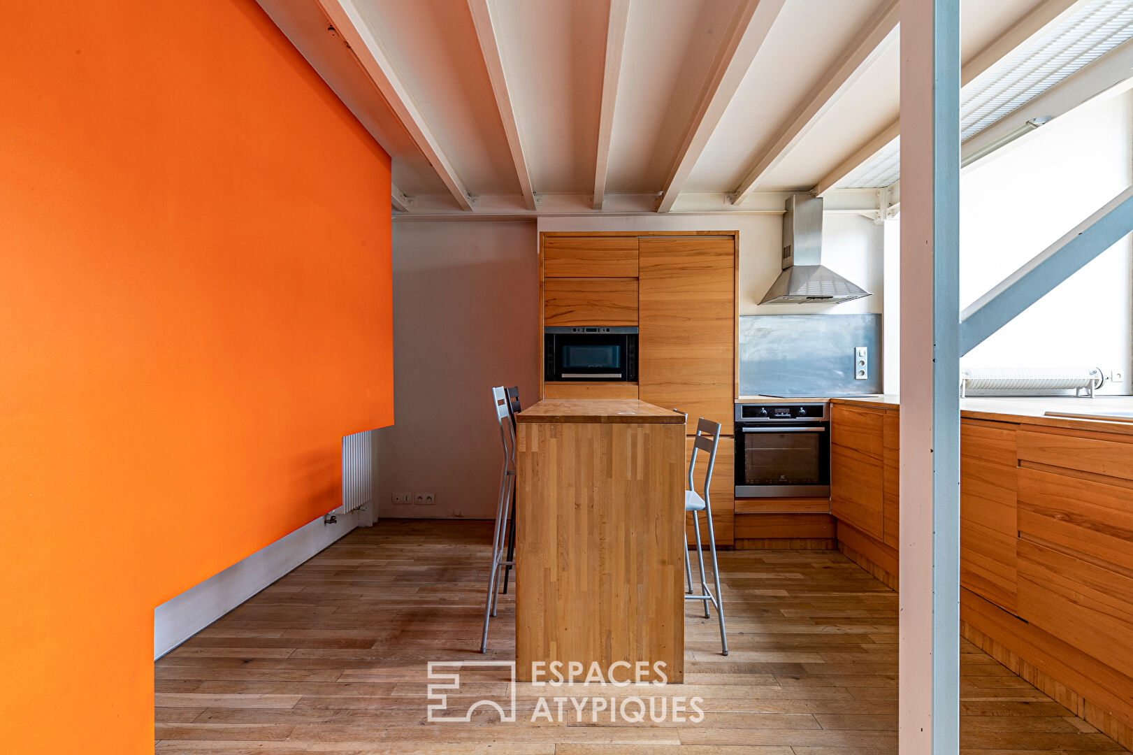 Artist’s loft with cascading glass roofs