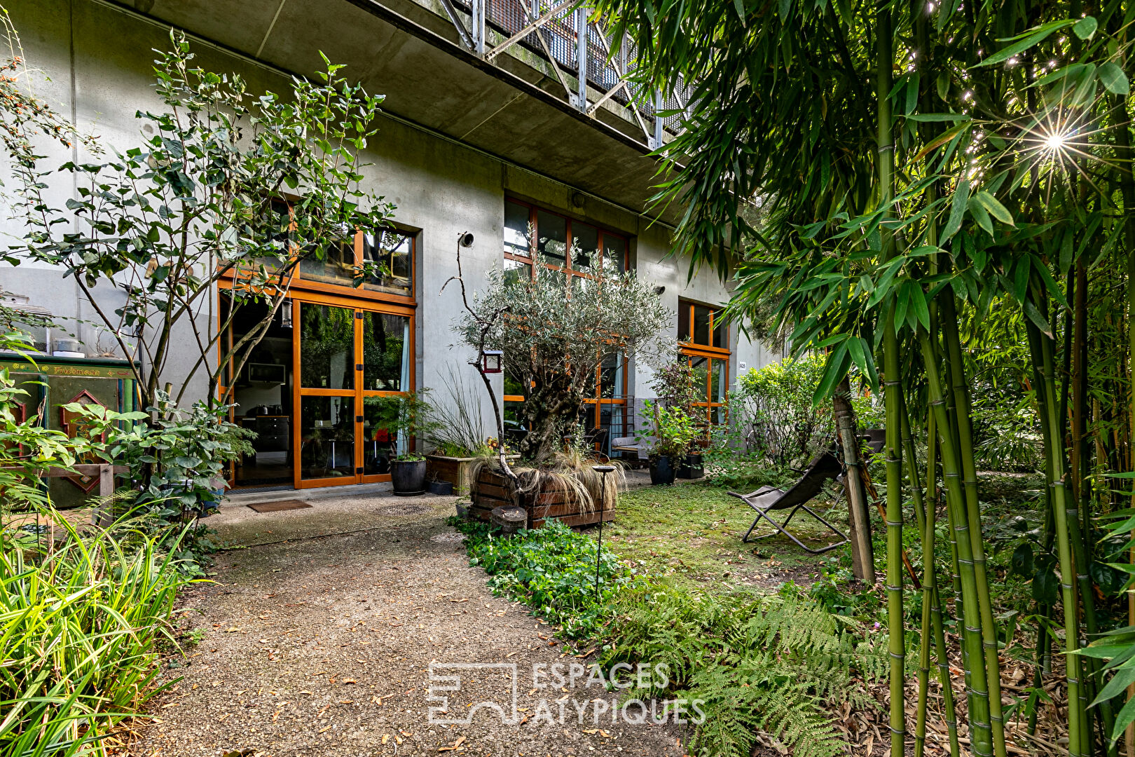 Loft d’architecte en duplex sur jardin luxuriant