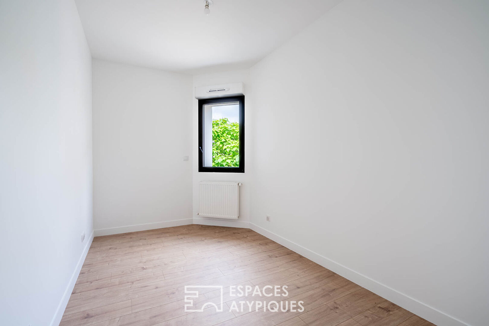Duplex avec jardin, esprit maison en plein Charentonneau
