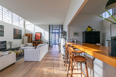 Loft convivial avec terrasse et son oasis de verdure