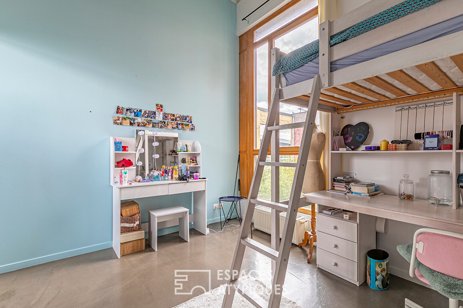 Duplex loft with terrace in a former grain factory