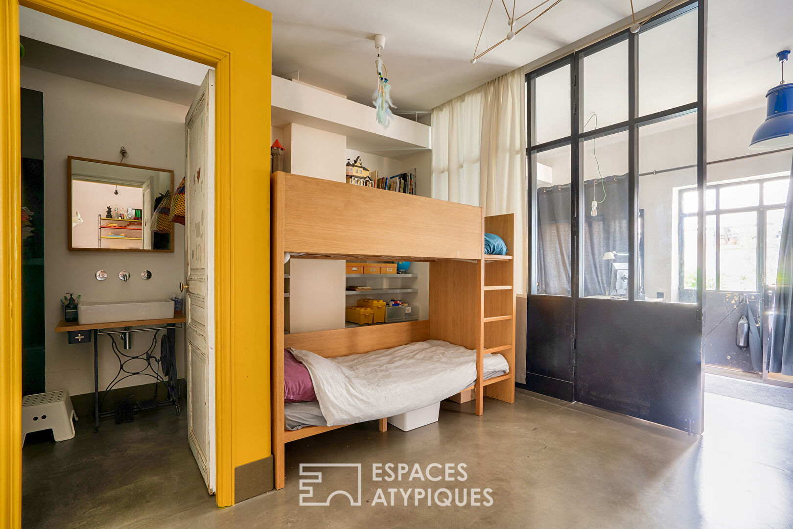 Loft d’artiste en rez-de-jardin