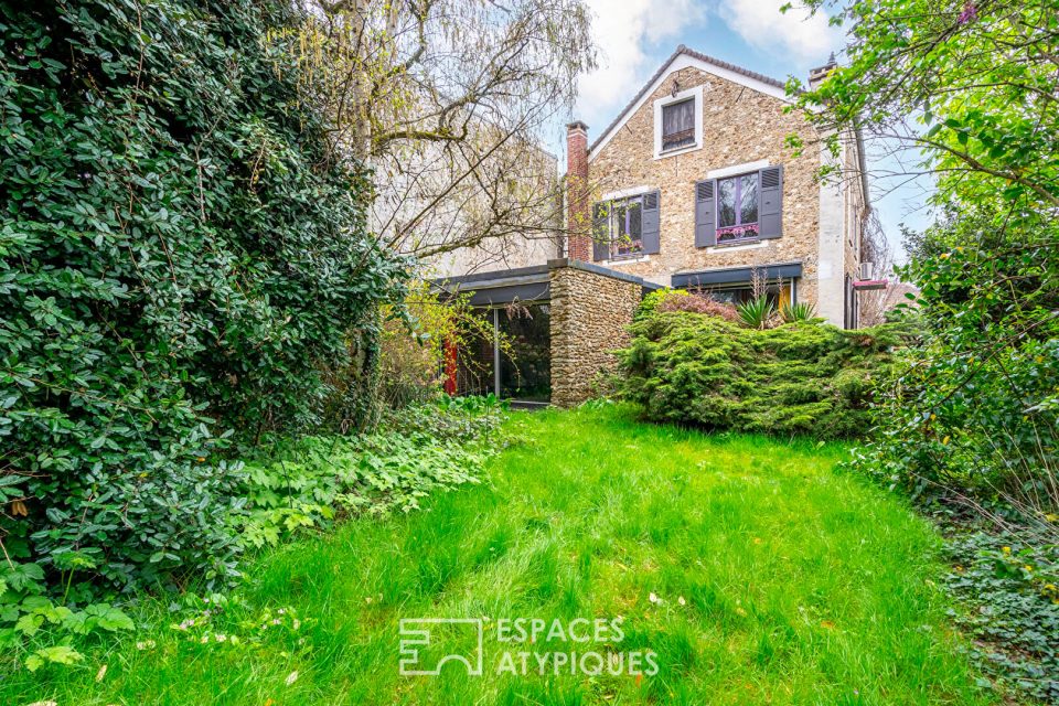 Maison de ville avec extension et jardin luxuriant