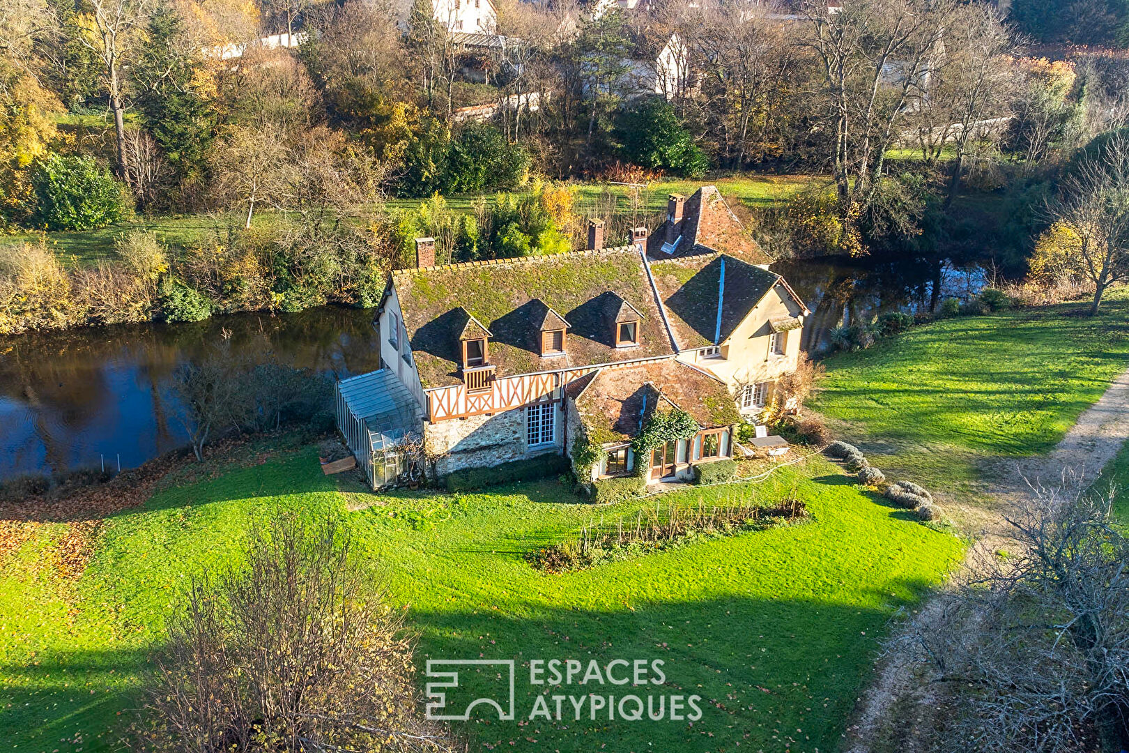 Historic family home with its sumptuous woods and pond.