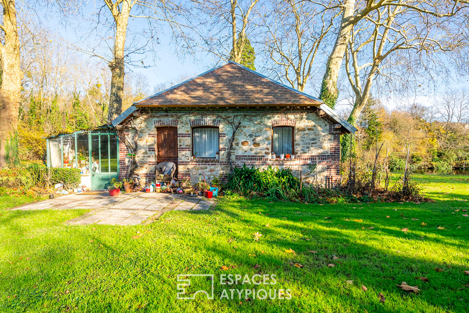 Historic family home with its sumptuous woods and pond.