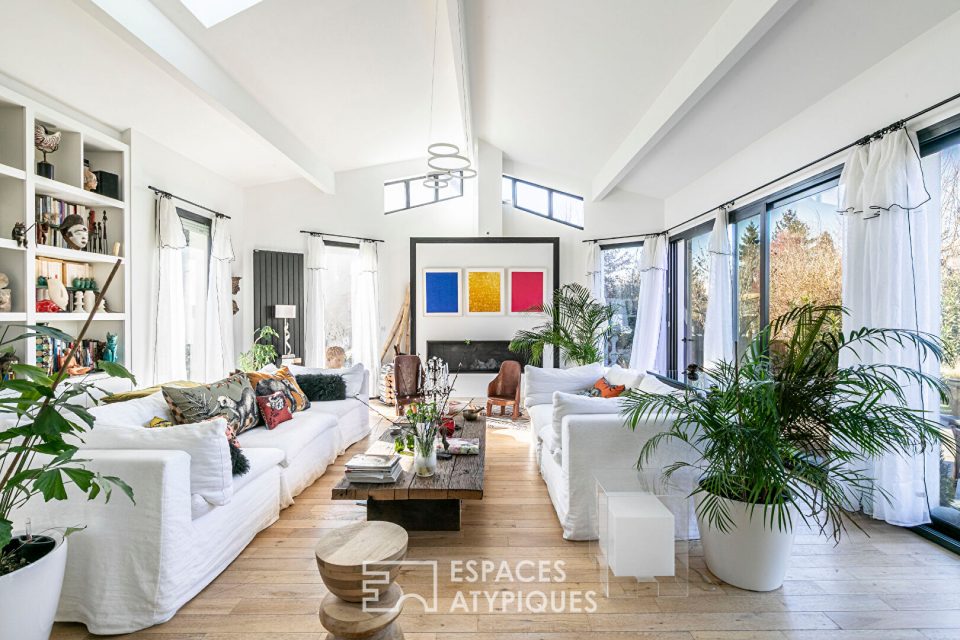 Maison avec extention d'architecte et son jardin bucolique