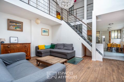 Maison style loft avec jardin