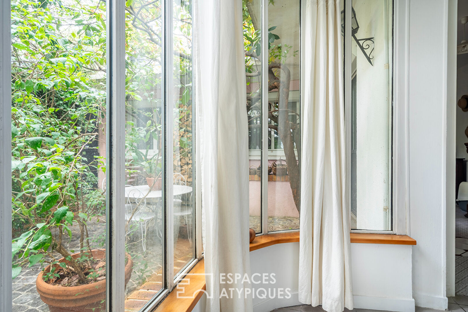 Maison avec patio et jardin