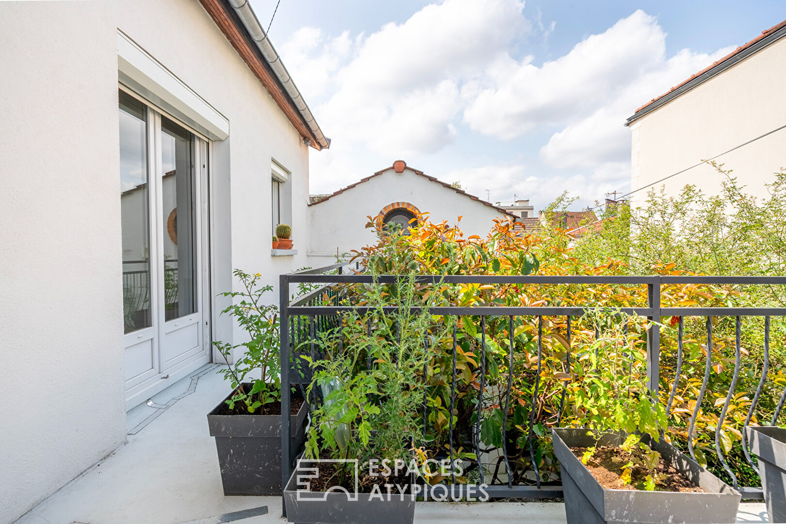 Maison avec patio et jardin