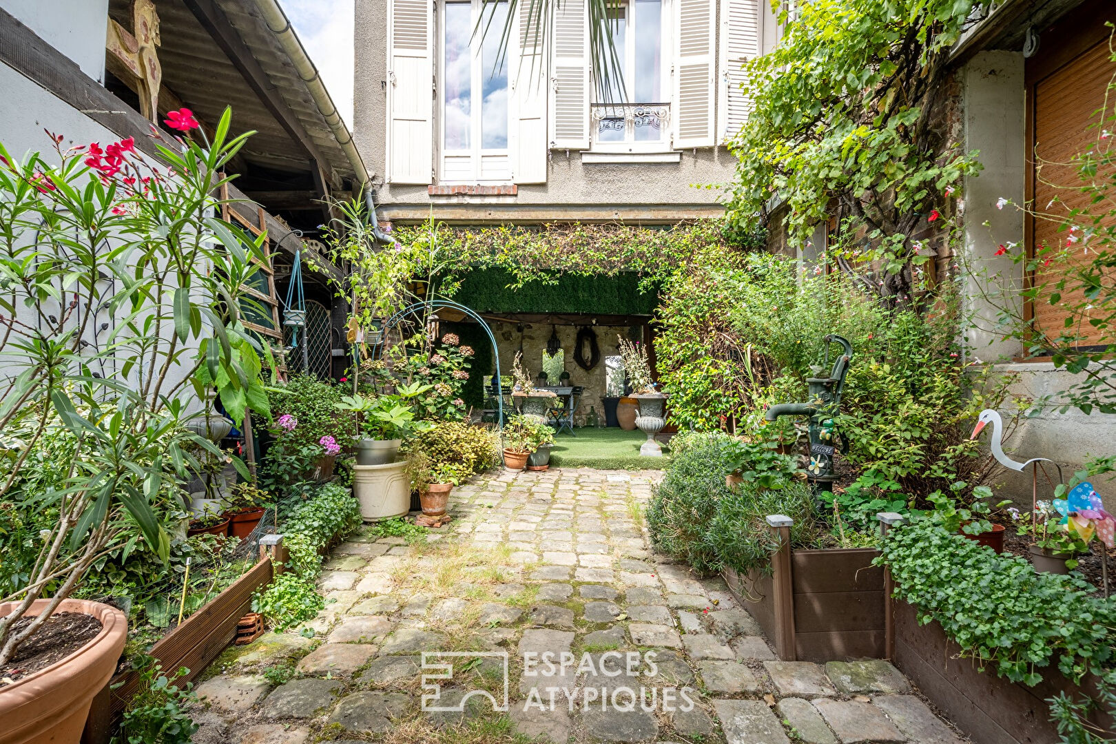 Maison familiale dans ancien atelier