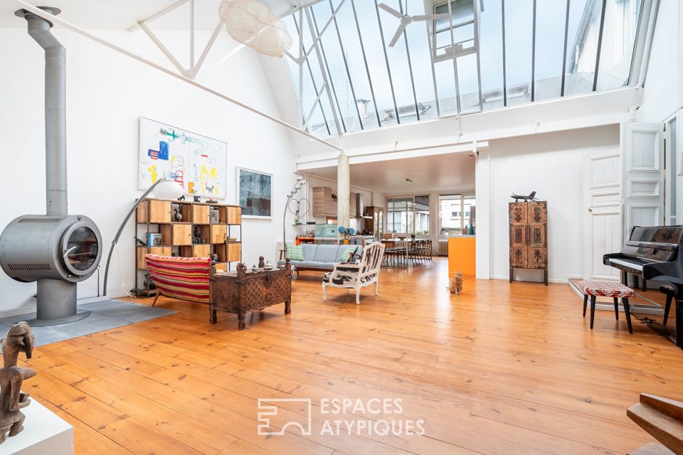 Loft traversant avec verrières zénithales