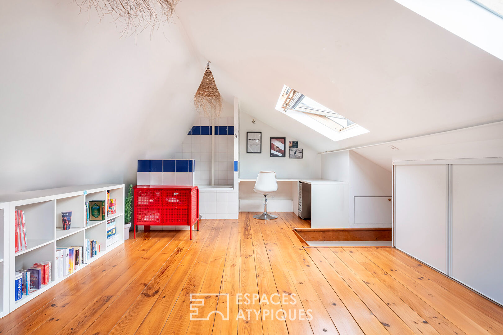 Loft traversant avec verrières zénithales