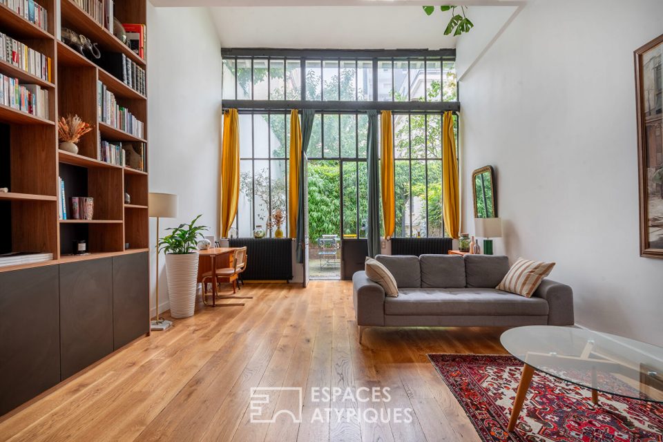 Loft traversant avec verrière et terrasse