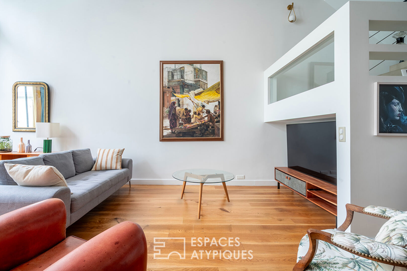 Loft traversant avec verrière et terrasse