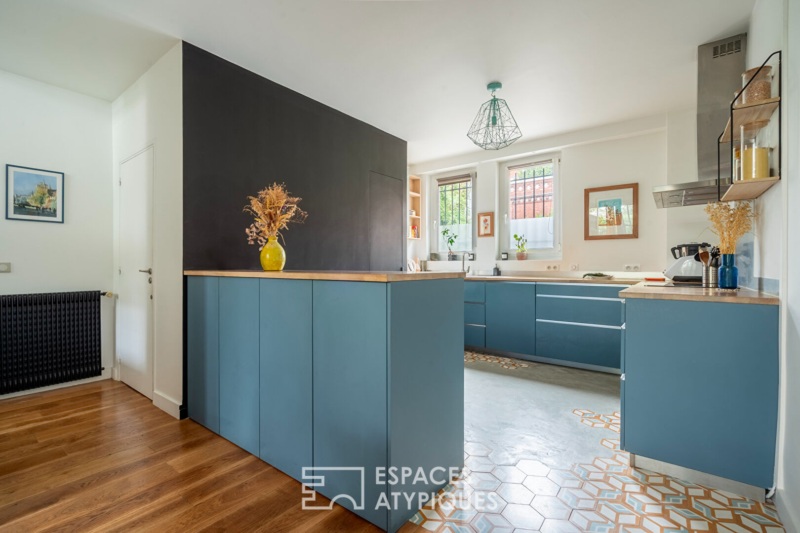 Loft traversant avec verrière et terrasse