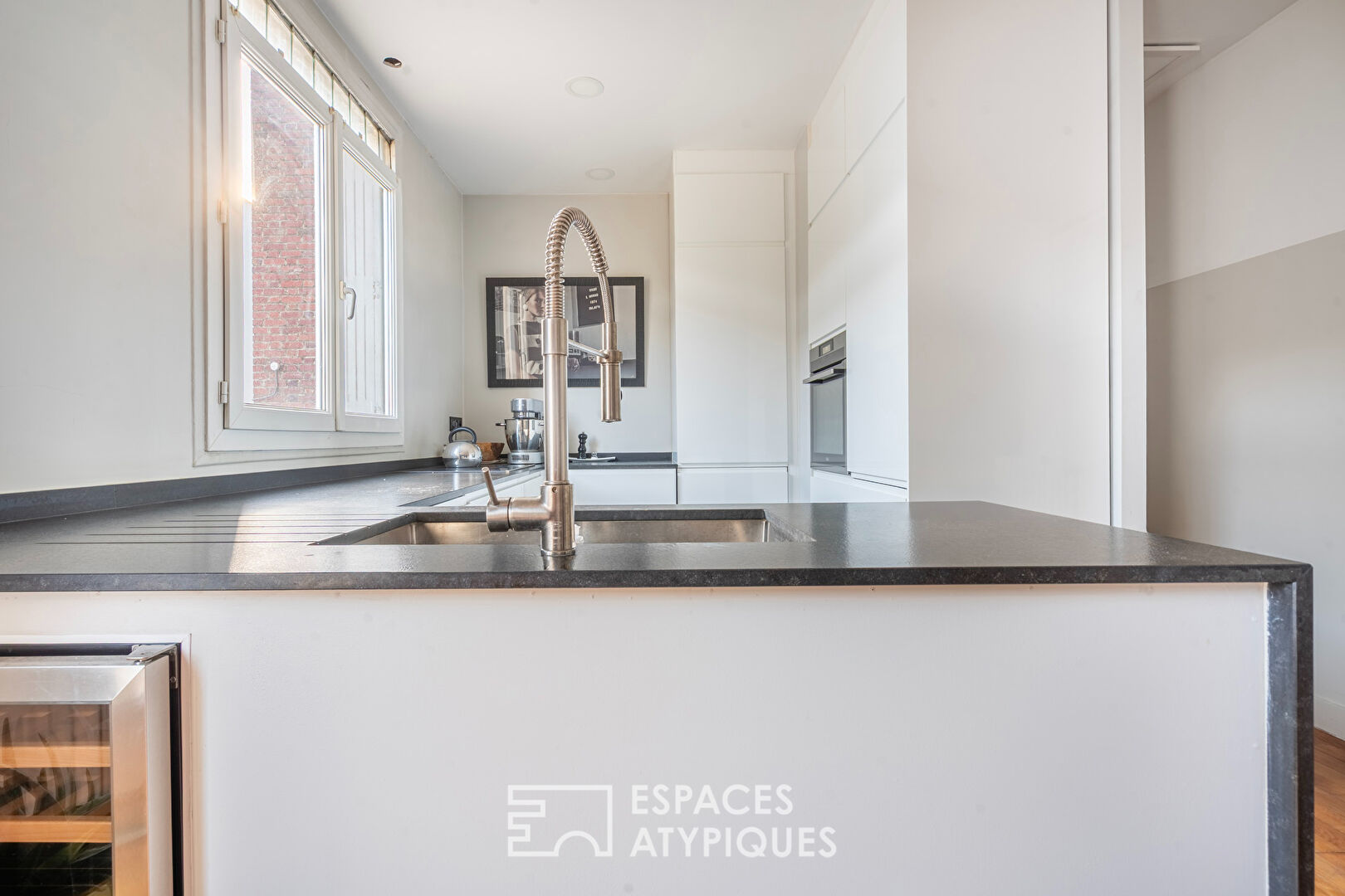 Appartement traversant au pied du canal de l’Ourcq