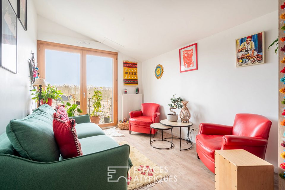 Appartement d'architecte au dernier étage avec balcon