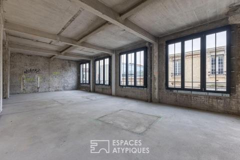 Loft industriel brut à aménager