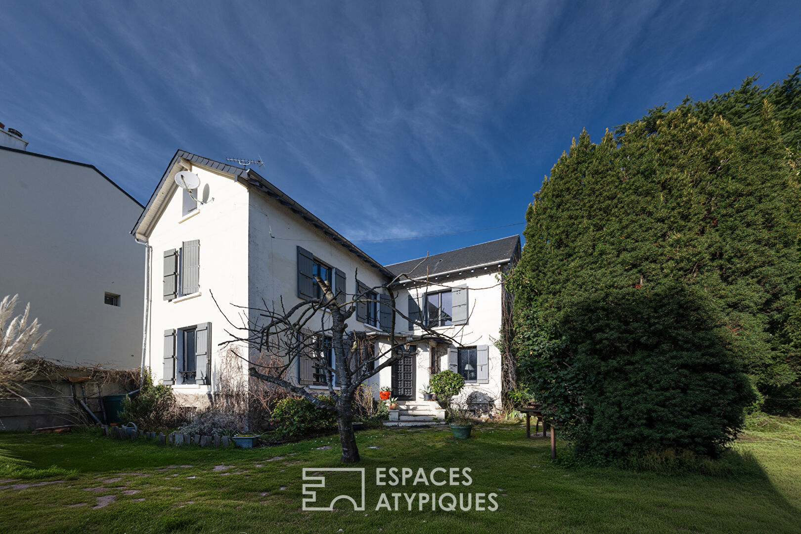 Maison familiale avec jardin arboré
