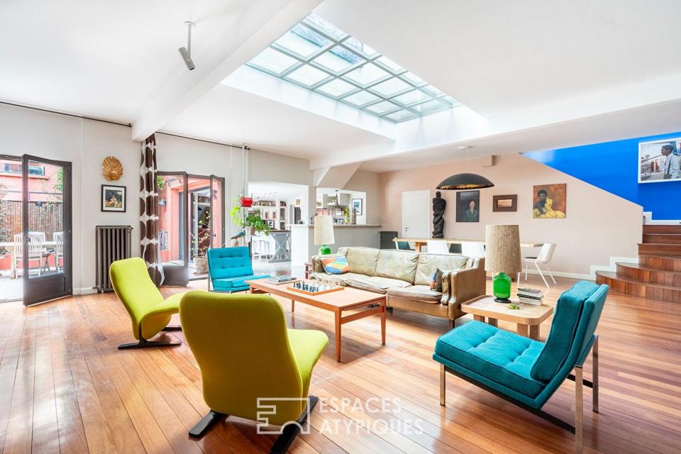 Maison à l'esprit loft avec cour