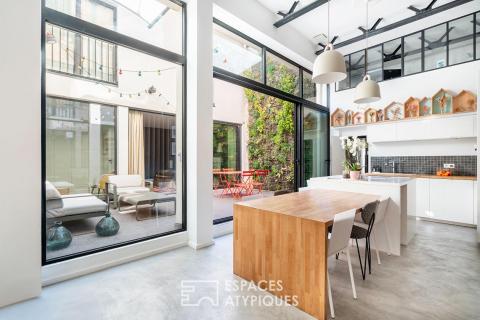 Loft avec patio dans une ancienne usine