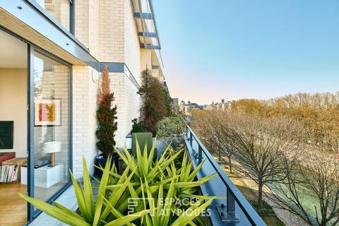 Duplex en dernier étage avec terrasses sur le Canal