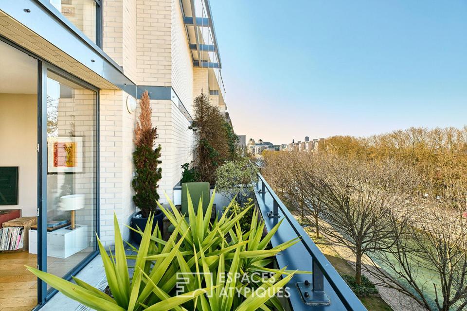 Duplex en dernier étage avec terrasses sur le Canal